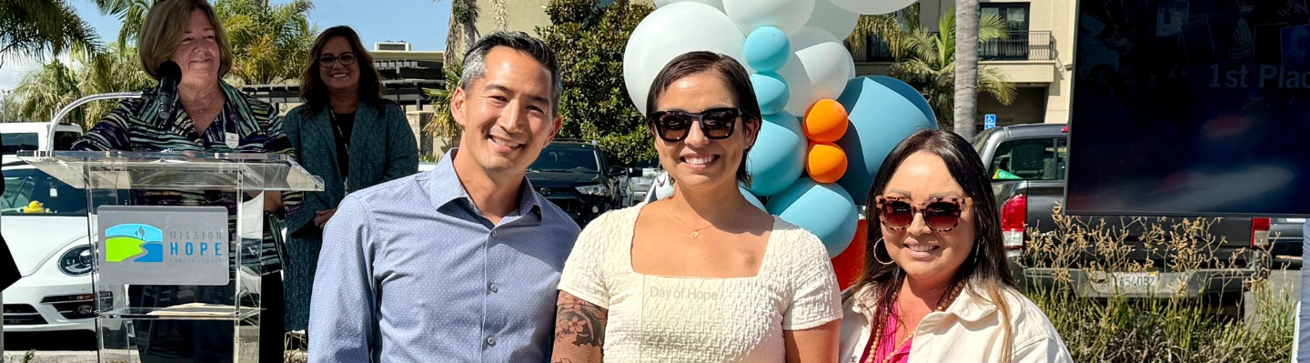 Mark and Eileen Hongo, the leaders of Team EJH pose for  photos after being named the top fundraising team for the 2024 Day of Hope, raising over $36,000.