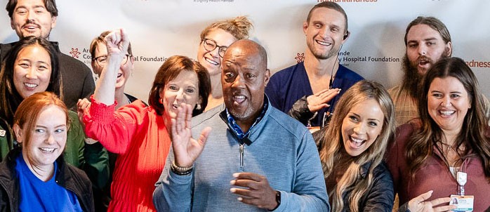 Gerald Sanders, center, celebrates during a reunion at Arroyo Grande Community Hospital Friday to recognize his progress after experiencing a stroke in March. Sanders was treated at Marian Regional Medical Center, Arroyo Grande Community Hospital's Acute Rehabilitation Unit and the Centre for Neuro Skills in Los Angeles.