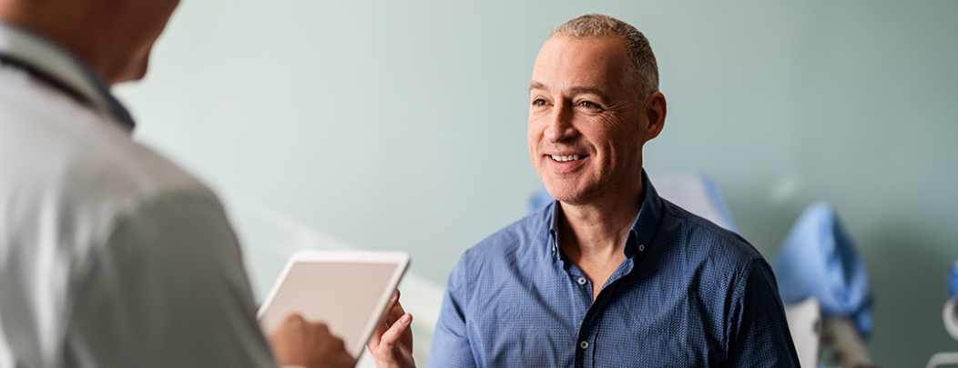 Man talking with doctor