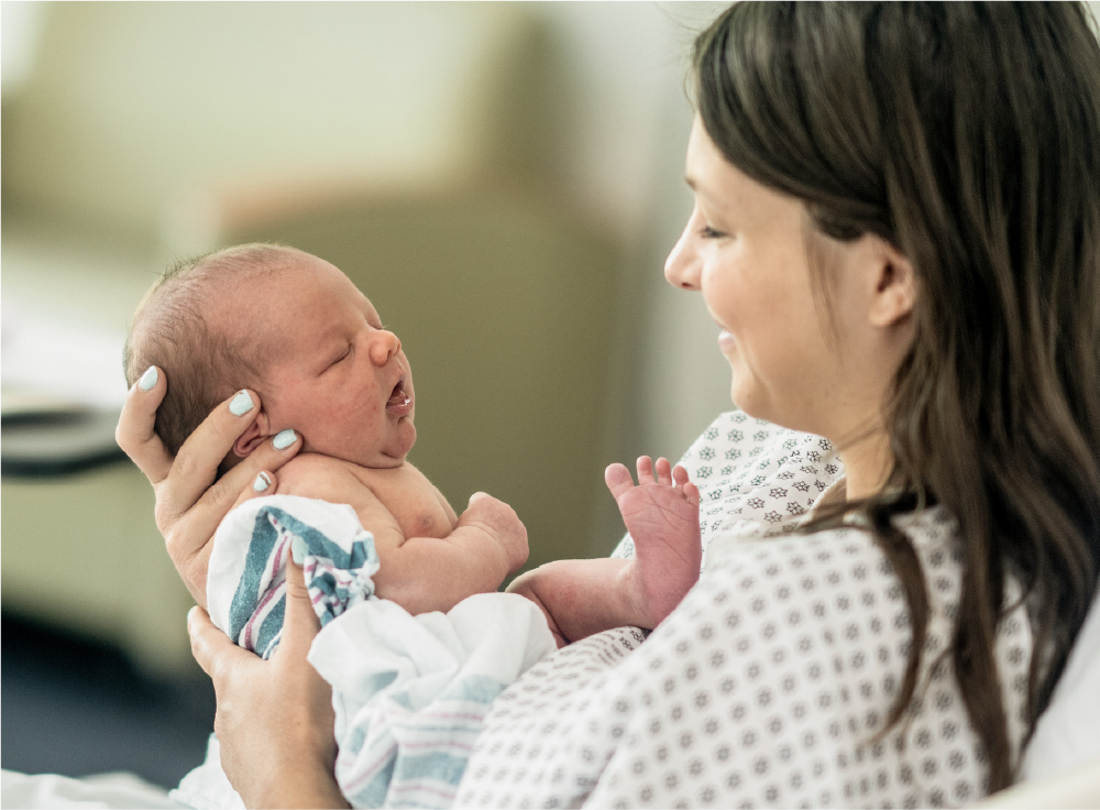 Mother holding newborn baby