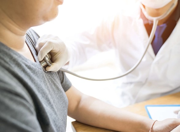 Doctor examining patient